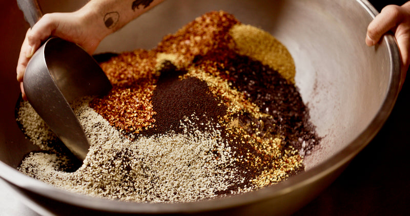 We sift the ground spices to achieve the perfect texture. We mix spices together to create our signature spice blend recipes.