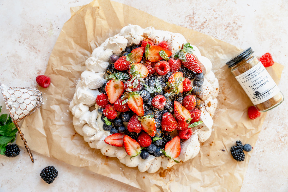 Cinnamon Pavlova with Berries and Maple Whipped Cream