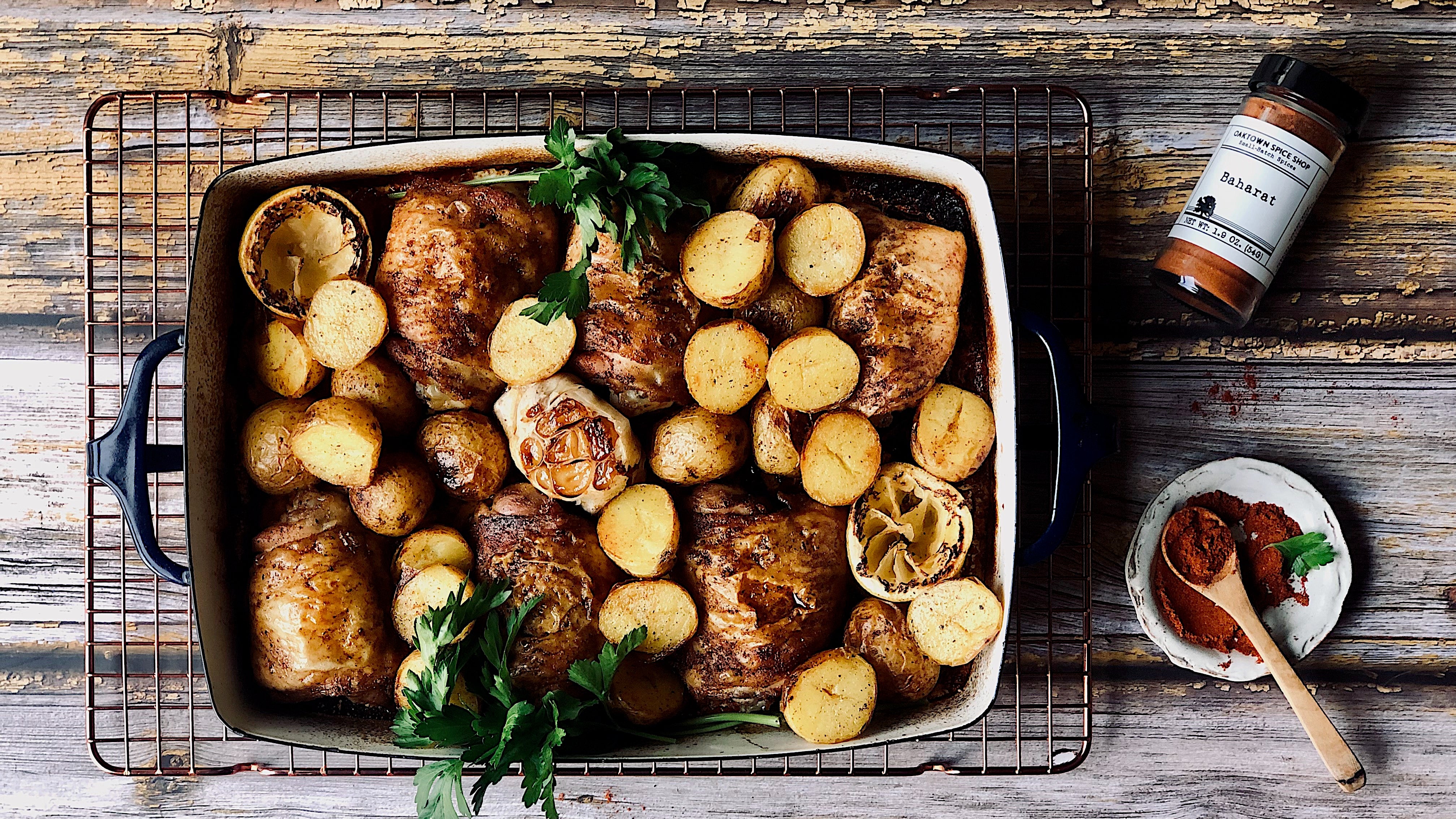 Crispy Chicken Thighs and Potatoes with Baharat and Lemon