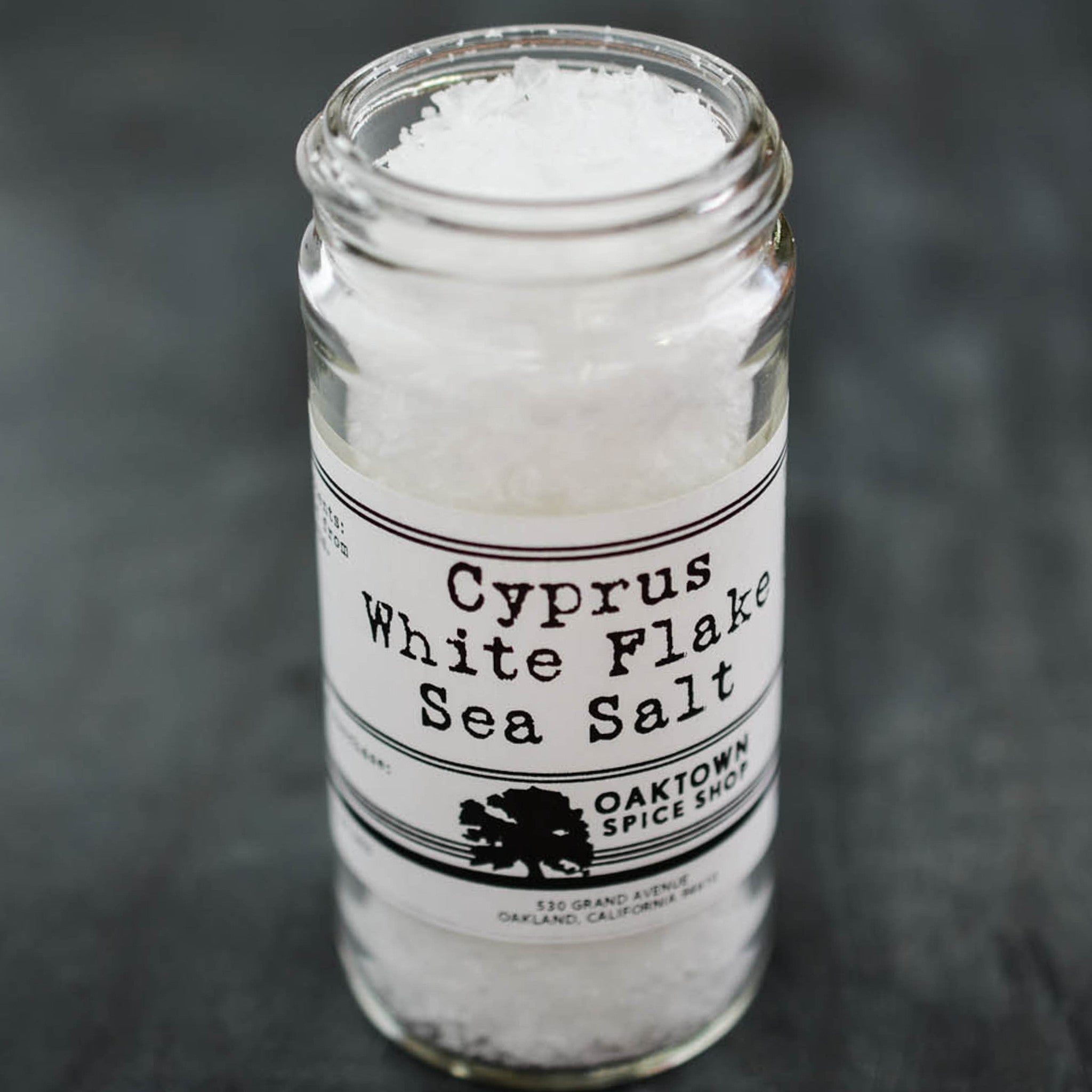 Cyprus White Flake Sea Salt by Oaktown Spice Shop are large broad flakes from the Island of Cyprus are soft enough to crunch between your fingers and provide a lovely finish to every bite